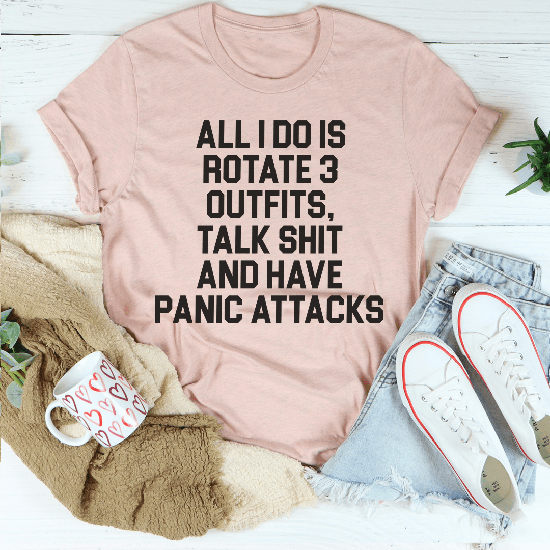 Mauve graphic T-shirt with bold 'ALL I DO IS ROTATE 3' text