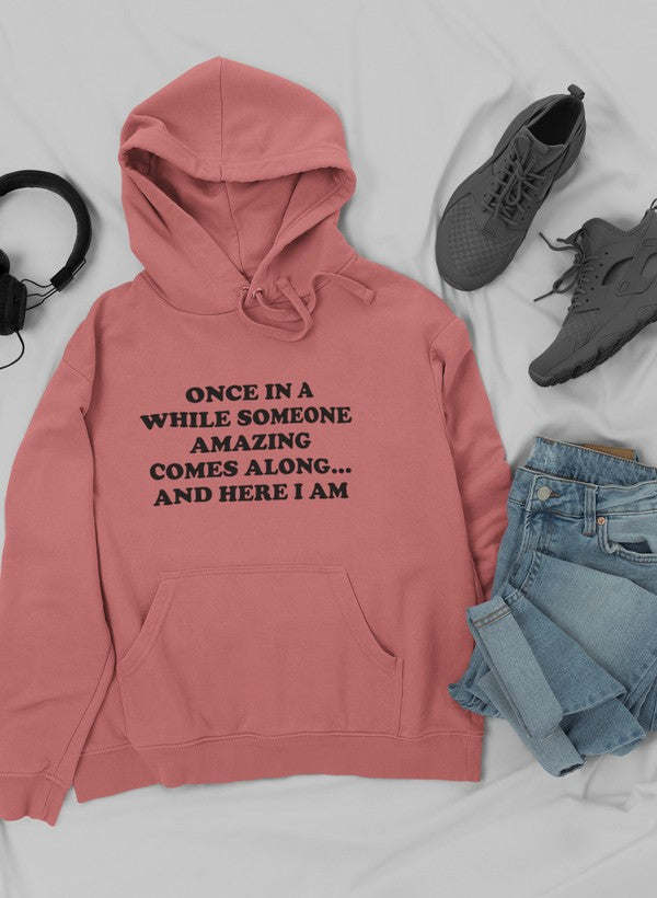 Dusty pink pullover hoodie with hood and front pouch pocket; black chest graphic design