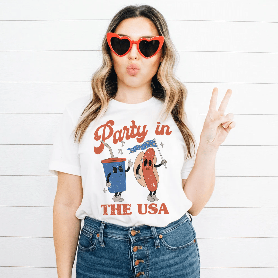 White T-shirt with 'Party in the USA' hot dog cartoon graphic