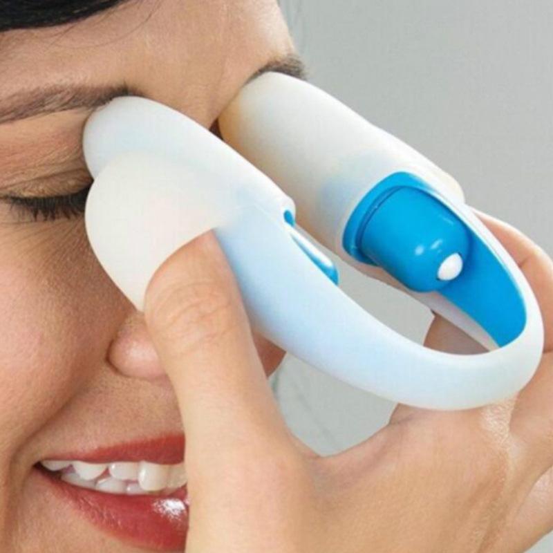 Eye massager with white U-shaped pads and blue control band near eye