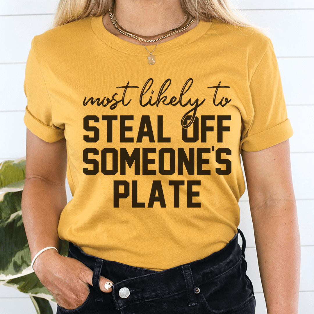 Mustard T-shirt with 'steal off someone's plate' black text graphic