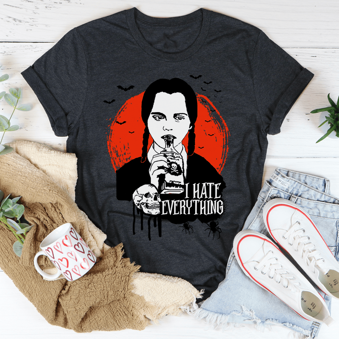 Dark grey graphic T-shirt with front portrait, orange hair, and text "I HATE EVERYTHING"