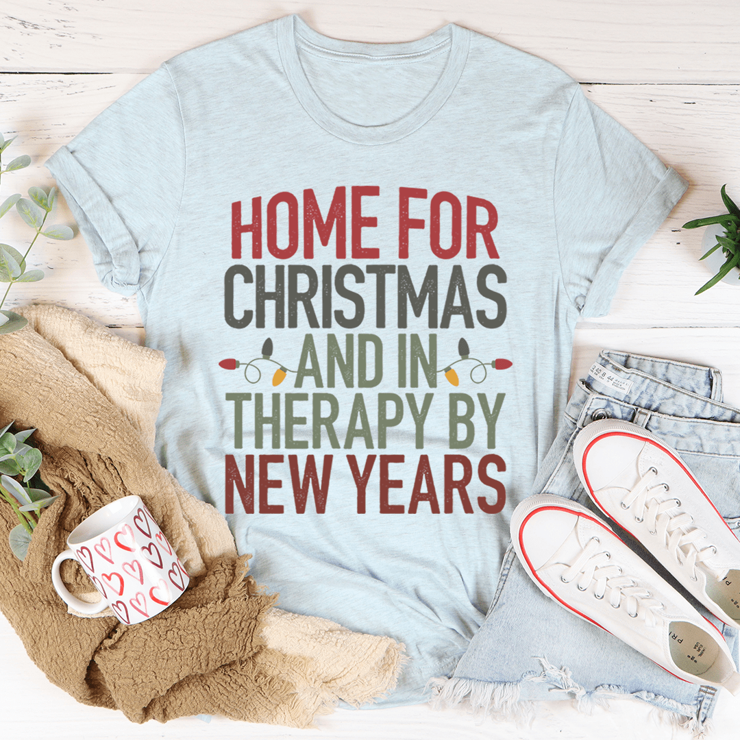 Ice blue crewneck graphic T-shirt with holiday slogan text