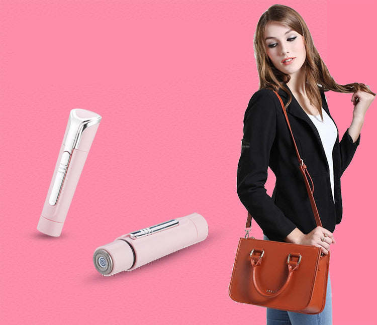 Pink grooming wand with rotating head, shown with multiple tools