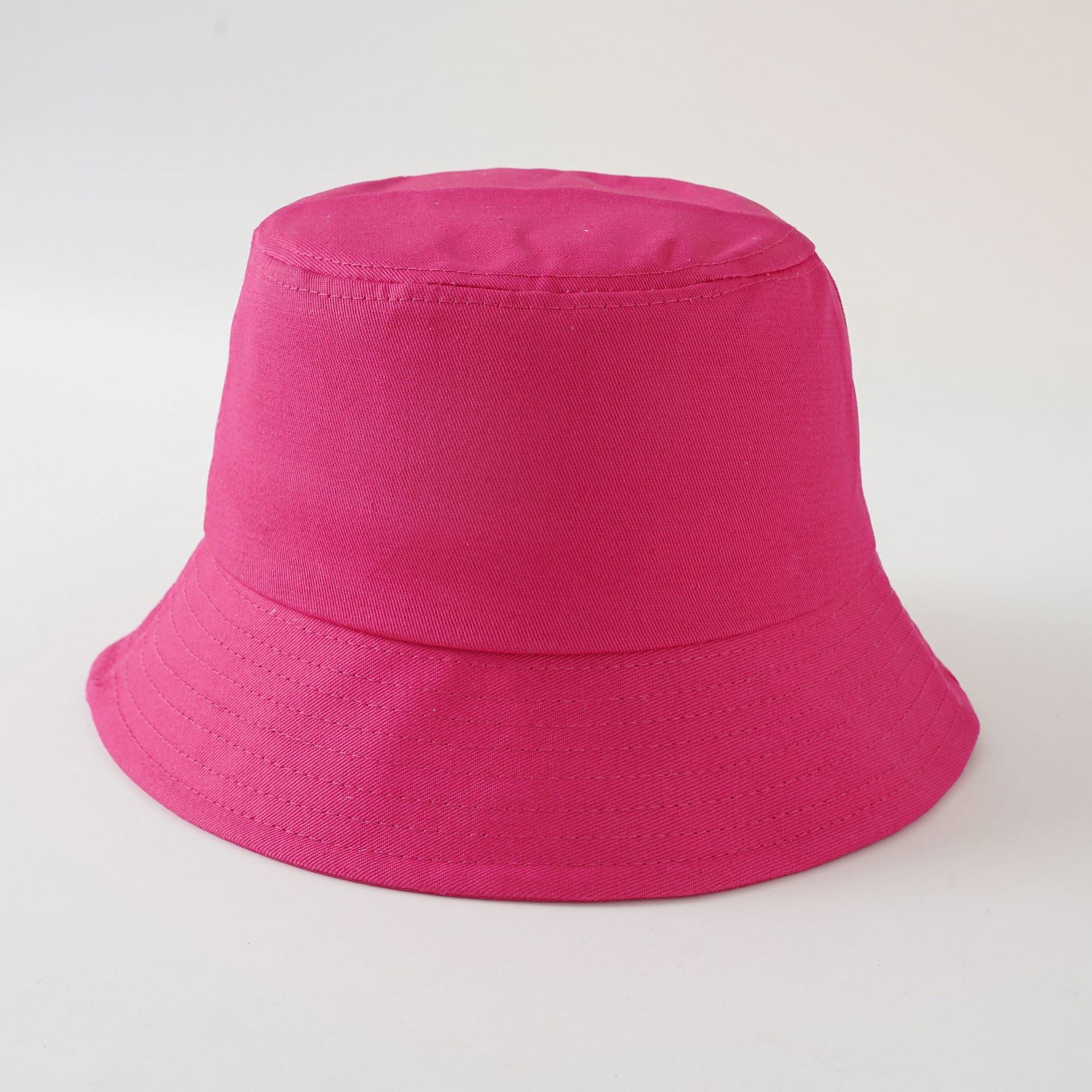 Rose pink fisherman hat with short brim and stitched band, solid color