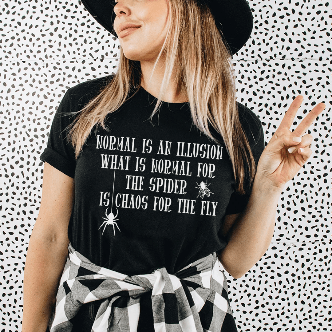 Black graphic spider slogan T-shirt on model, crew neck short sleeves