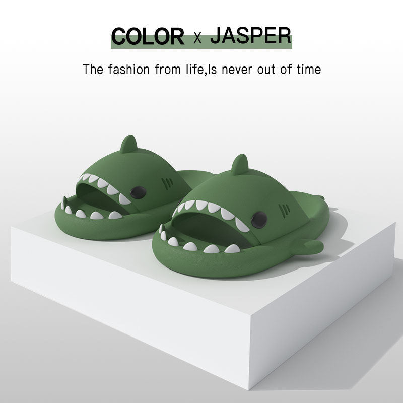 Shark-shaped EVA slides, dark green, white-tooth trim, black eyes, low profile pair