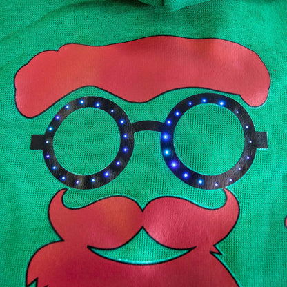 Green pet sweater face graphic with round LED-style sunglasses and pink mustache
