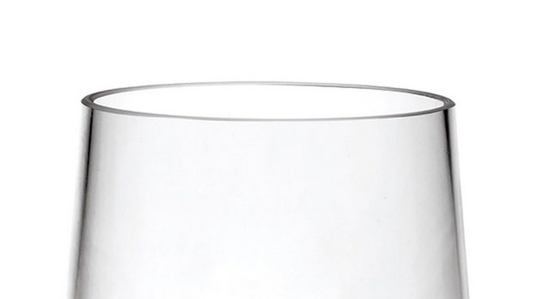 Plastic wine glass rim close-up, clear