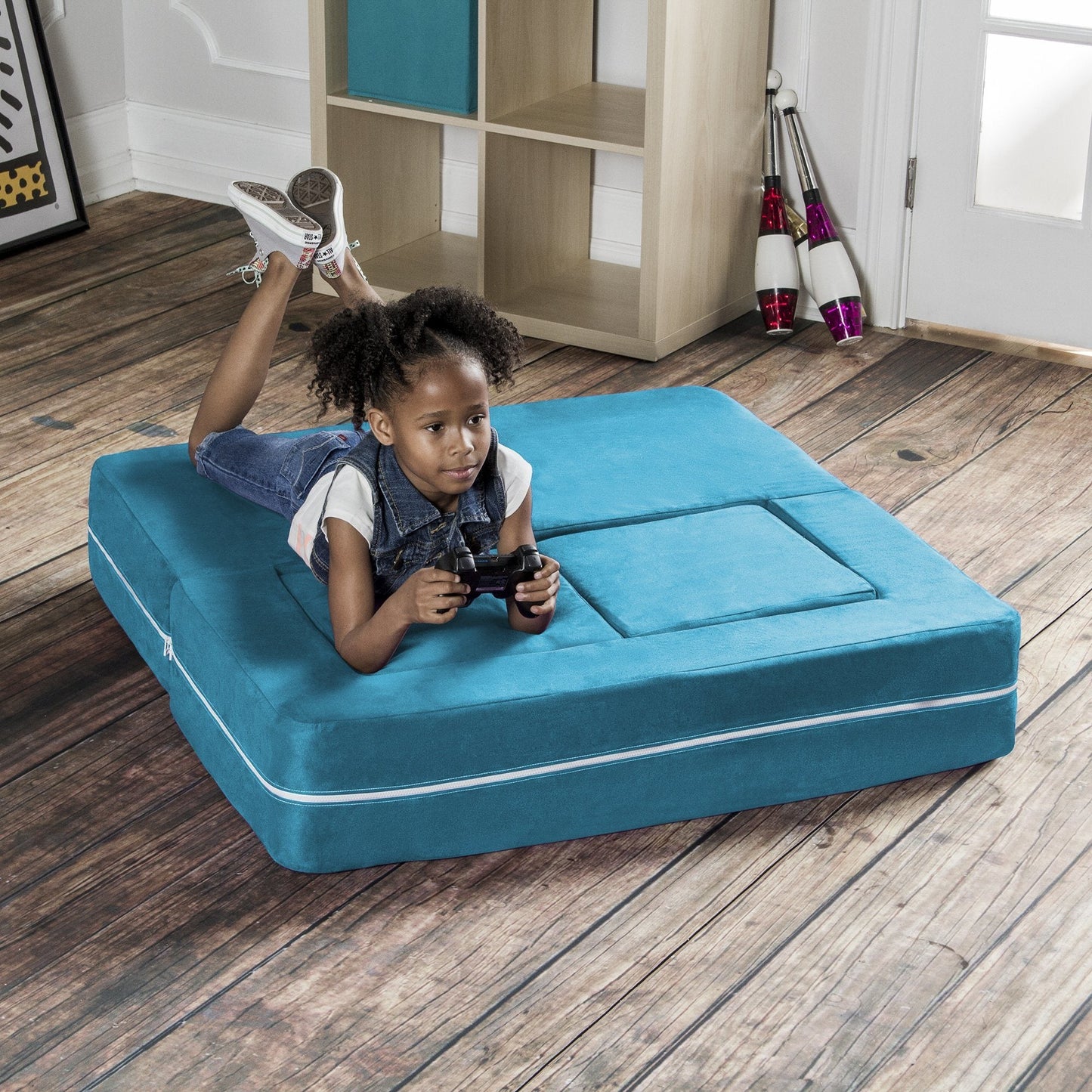 Teal microsuede modular kids loveseat with recessed play area and two ottomans.