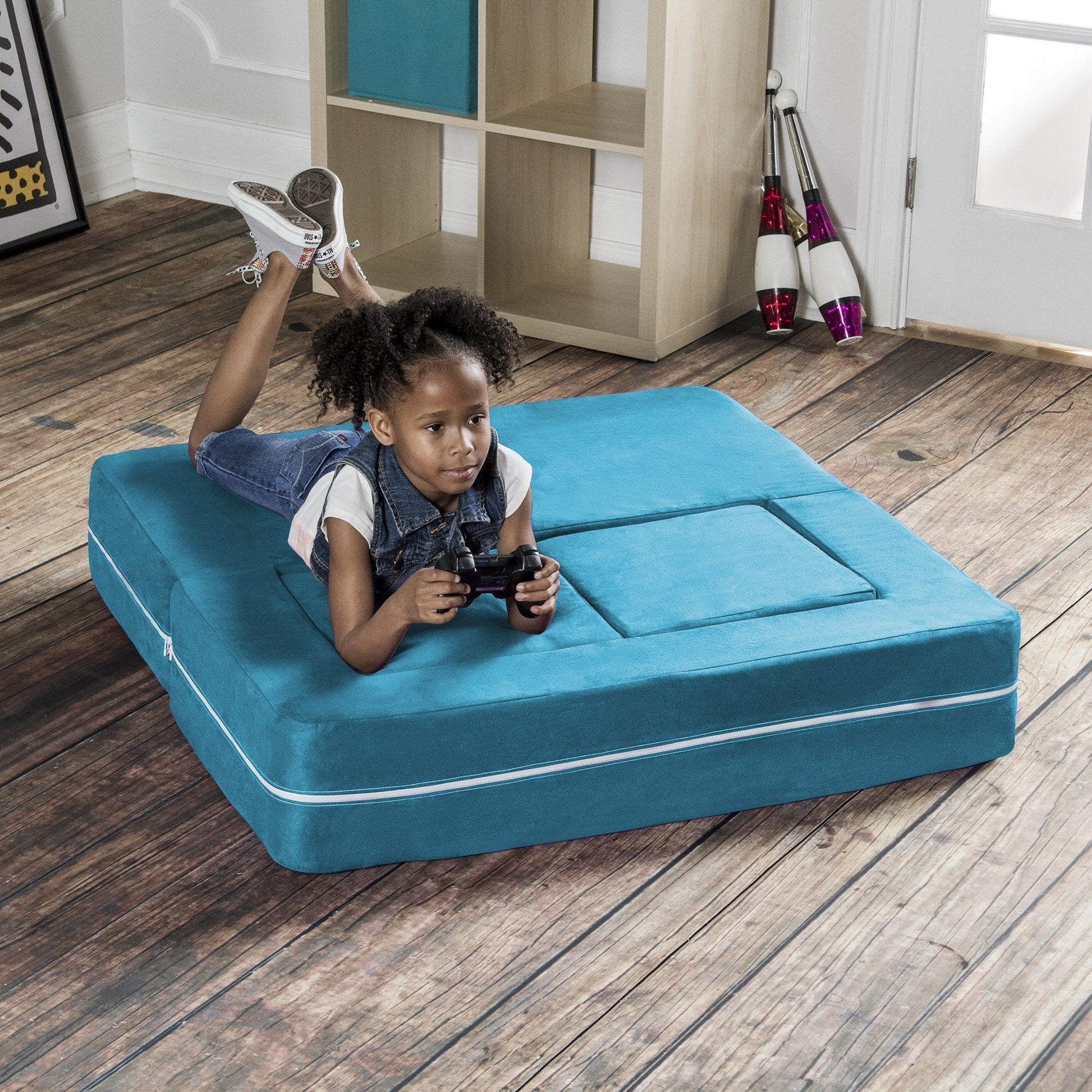 Teal microsuede modular kids loveseat with recessed play area and two ottomans.