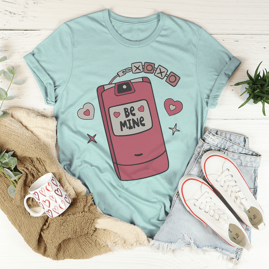 Dusty blue flip phone graphic t-shirt with heart accents on the front