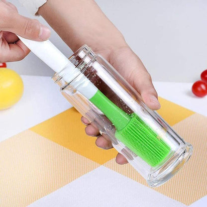 Silicone bottle brush cleaner with green ribbed head and clear long handle