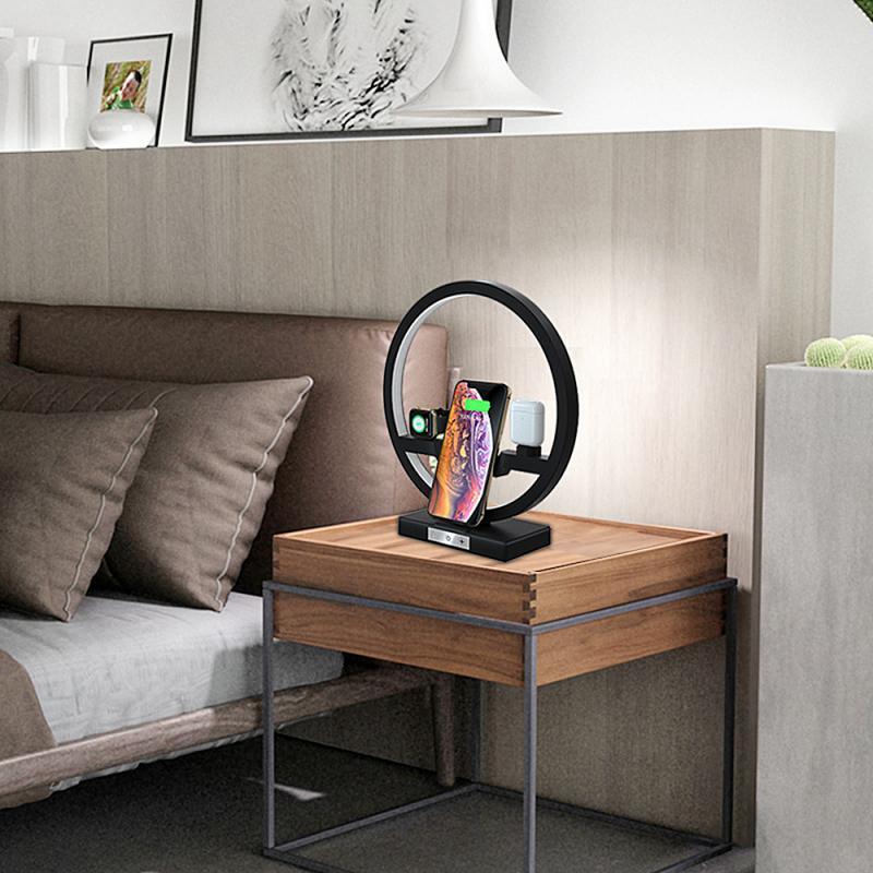 3-in-1 wireless charging stand with black ring base, holding smartphone