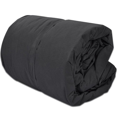 Dark gray caravan cover folded into a compact bundle