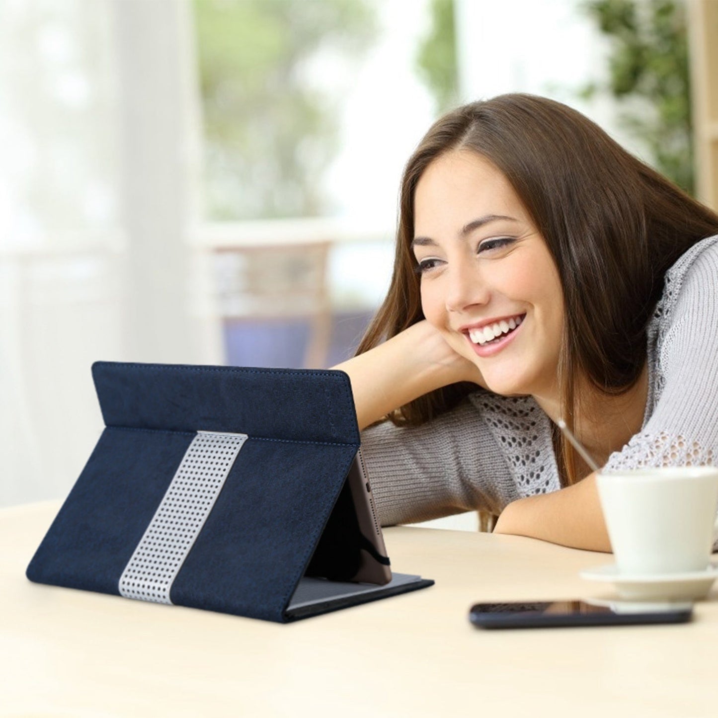 Navy tablet protector case in stand mode with memo panel visible.
