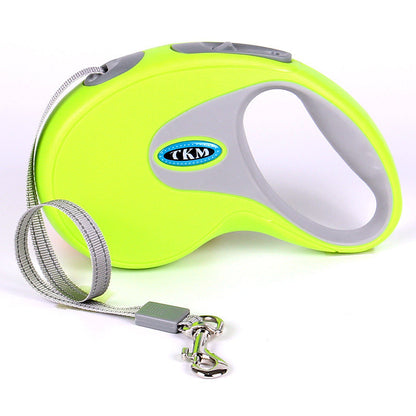 Green retractable pet leash reel with grey handle, nylon cord, and chrome snap hook