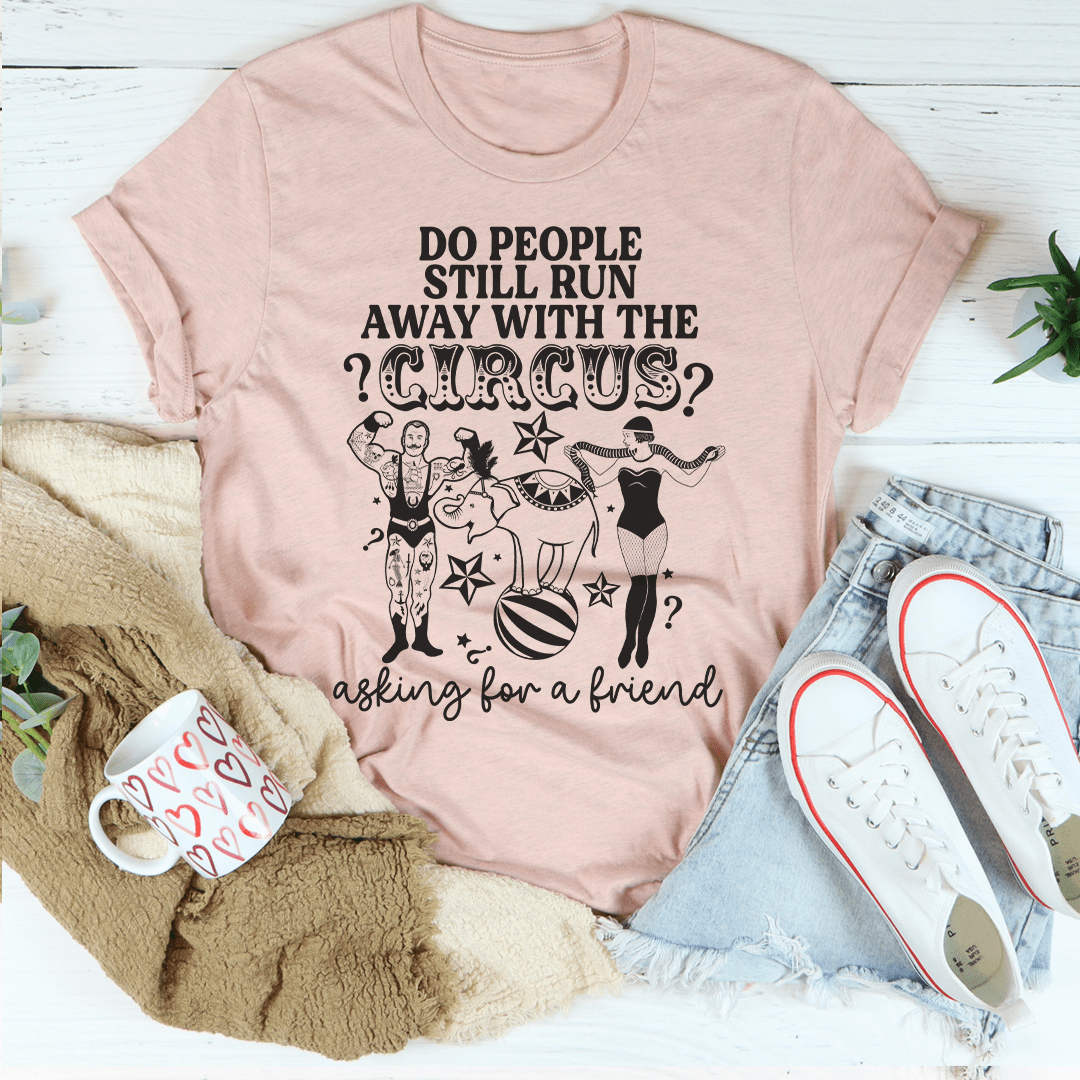 Mauve crewneck T-shirt with black circus graphic and 'Do People Still Run Away' text