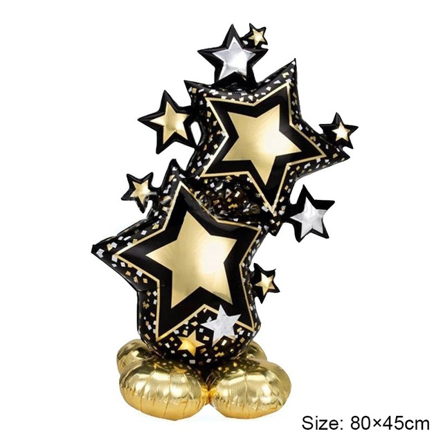 Black and gold star foil balloon decoration with metallic base balloons and multiple star shapes.