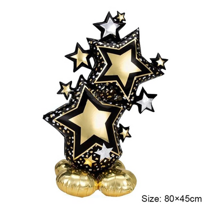 Black and gold star foil balloon decoration with metallic base balloons and multiple star shapes.