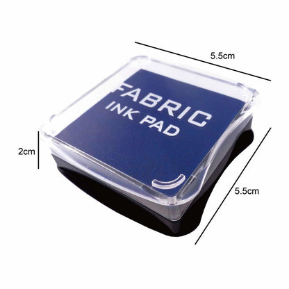 Blue fabric ink pad in clear square plastic case, with size marks