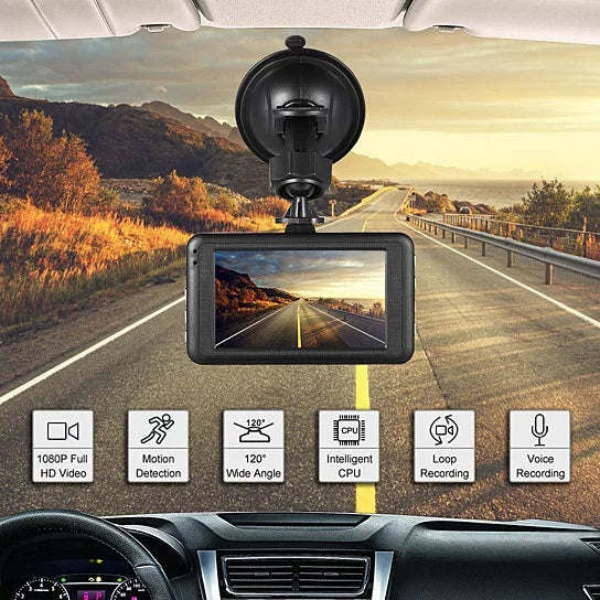 Car dash cam front unit with mounted lens and built-in display showing driving view