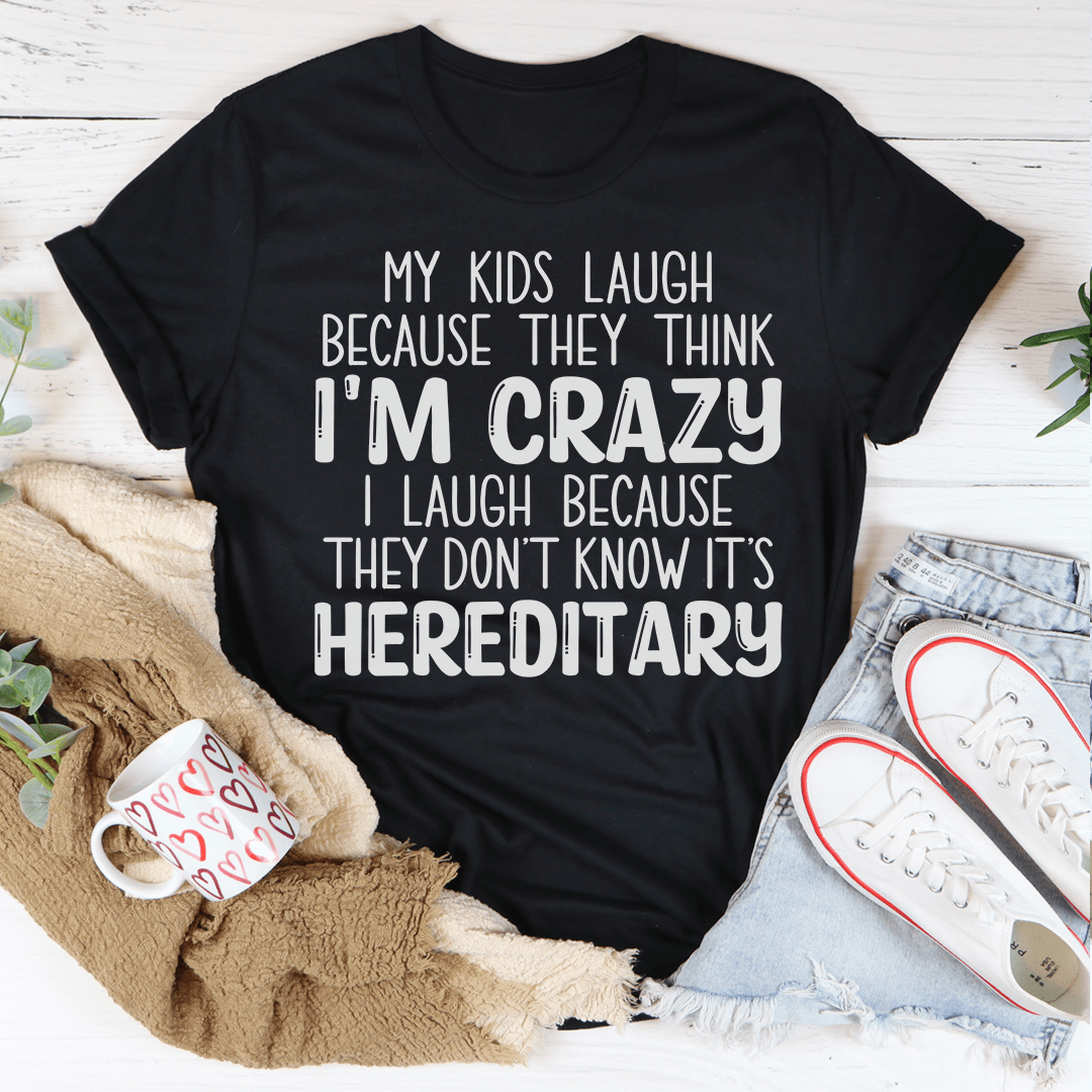 Black T-shirt with quote print: "I'M CRAZY" and "HEREDITARY"