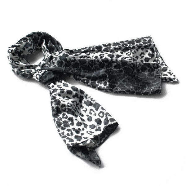 Leopard print natural silk scarf in black and white, with short fringed ends