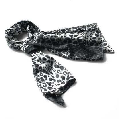 Leopard print natural silk scarf in black and white, with short fringed ends