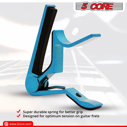 Blue guitar capo with black clamping bar and spring mechanism, angled view.