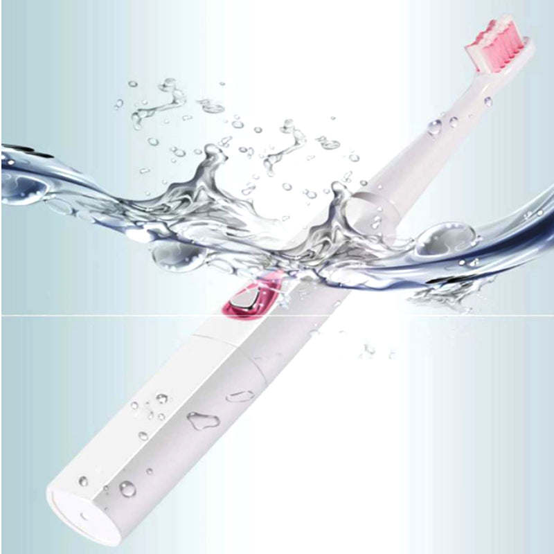 Ultrasonic electric toothbrush with pink brush head