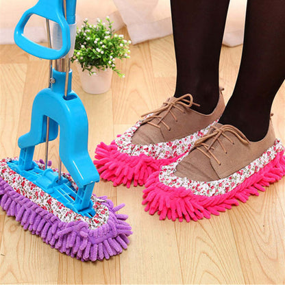 Slip-on mop slippers: pink and purple microfiber with floral-pattern fabric trim.