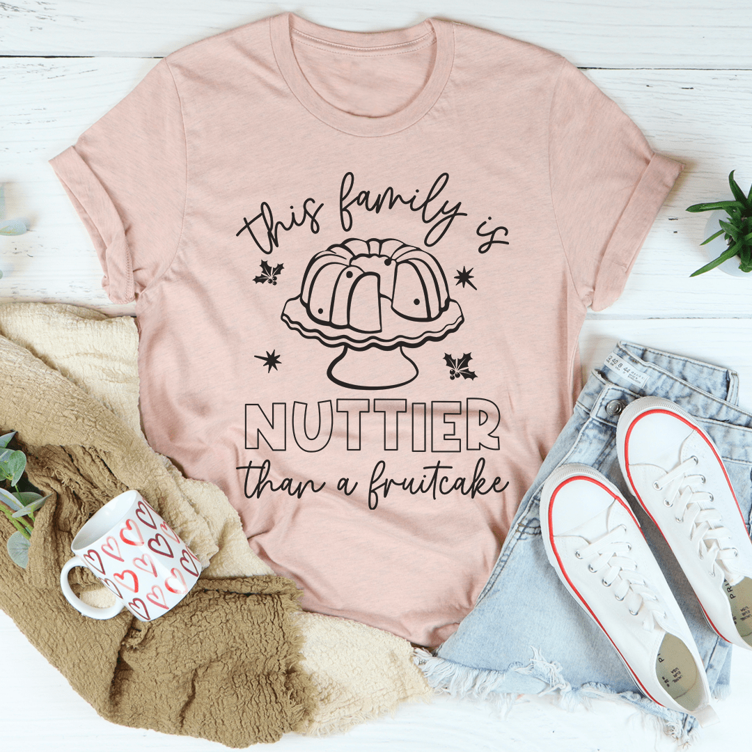 Peach T-shirt with 'NUTTIER than a fruitcake' graphic
