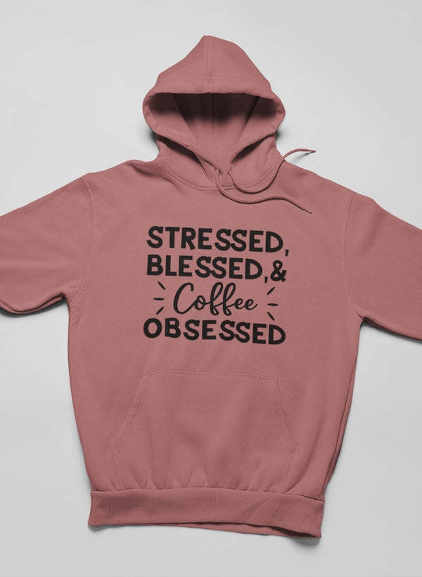Mauve hoodie with hood, front pouch pocket, and “Stressed Blessed & Coffee Obsessed” graphic