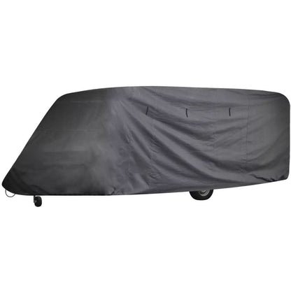 Gray caravan cover draped over travel trailer roof and sides