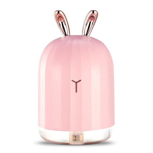 Pink bunny-shaped cool mist humidifier with glossy rose-gold ear handles
