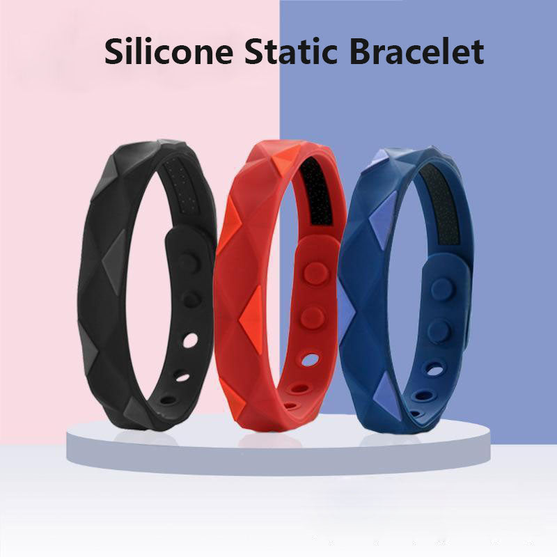 Anti-static bracelet set in black, red, and blue silicone with textured strap and holes