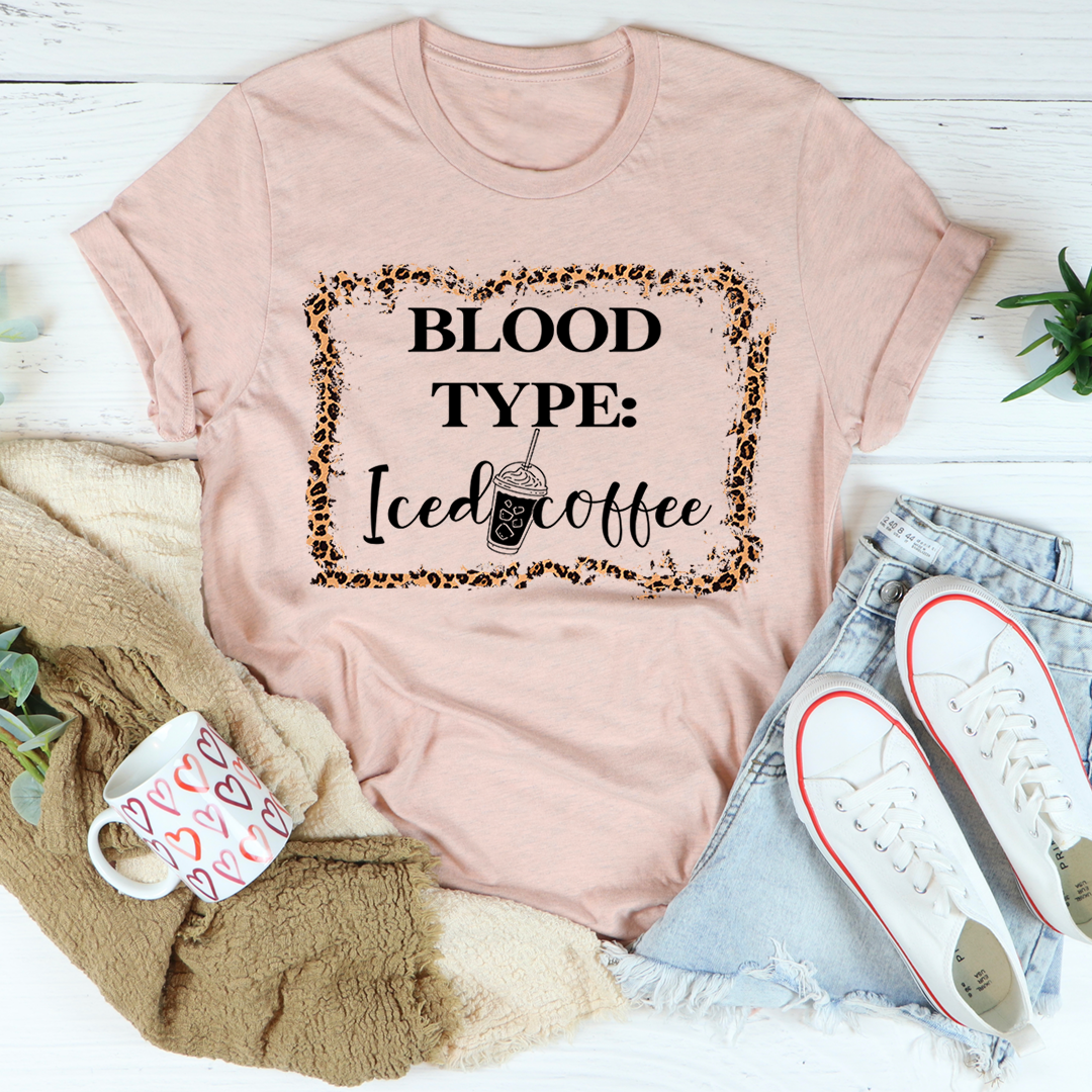 Light pink crewneck T-shirt with 'BLOOD TYPE: Iced coffee' leopard frame print