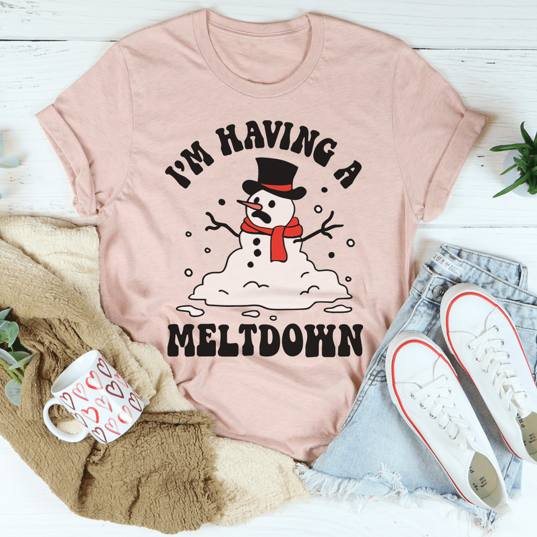 Peach T-shirt with snowman graphic and text “I’m Having a Meltdown”