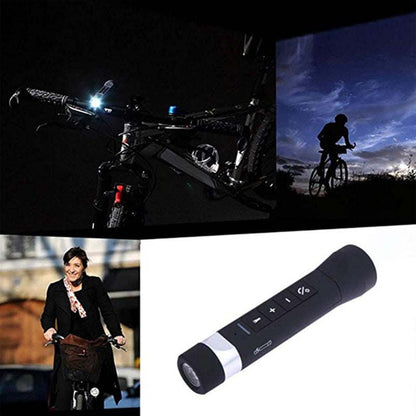 Black Bluetooth speaker flashlight used at night on a bicycle and outdoors