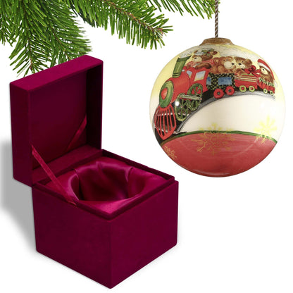 Glass hanging ornament ball with red train teddy design in open gift box