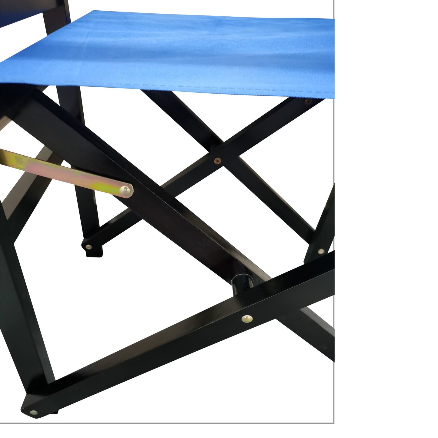 Close-up of blue fabric seat and black X-frame folding chair legs