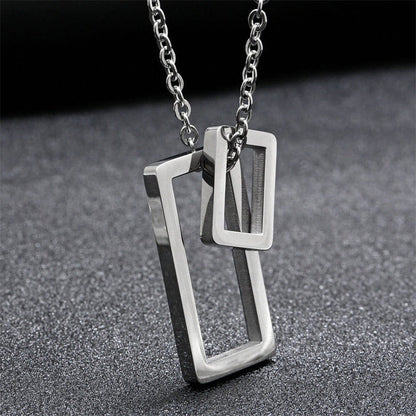 Silver geometric double-rectangle pendant necklace with vertical outline bars