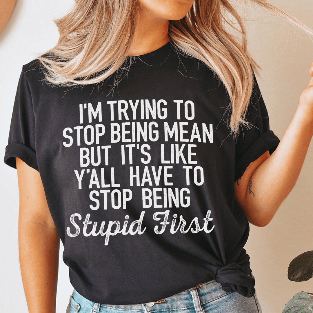 Black graphic slogan T-shirt with crew neck, short sleeves, and front knot
