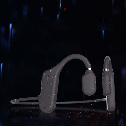 Gray open-ear wireless headphones with water droplets for wet-weather use.