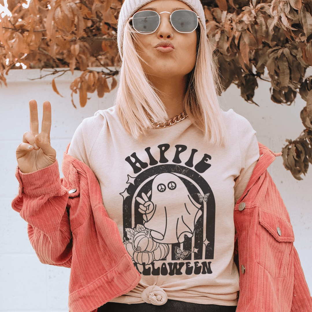 Hippie Halloween T-shirt, light heather with black arched hippie Halloween graphic front.