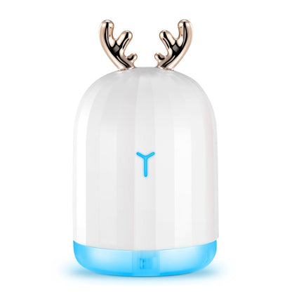 White cool mist humidifier with rose-gold antler top and blue lit base