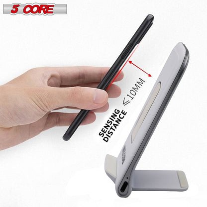 White wireless charger stand with front USB port and slim, angled design