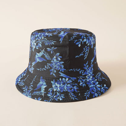 Black bucket hat with blue botanical print and birds, wide brim