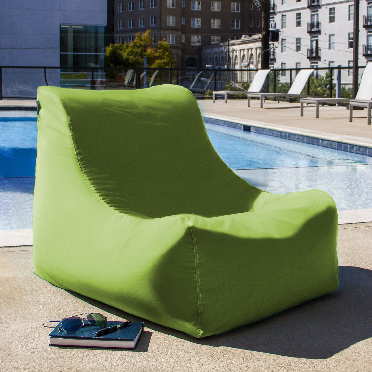 Lime outdoor bean bag chair, low lounge shape with curved back